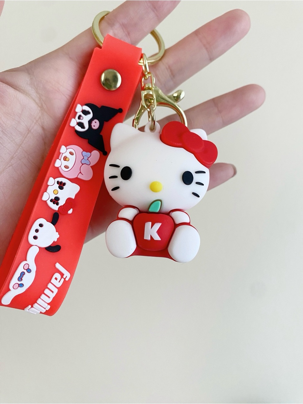 Hello Kitty Red and White Apple Keychain with Gold Hardware
